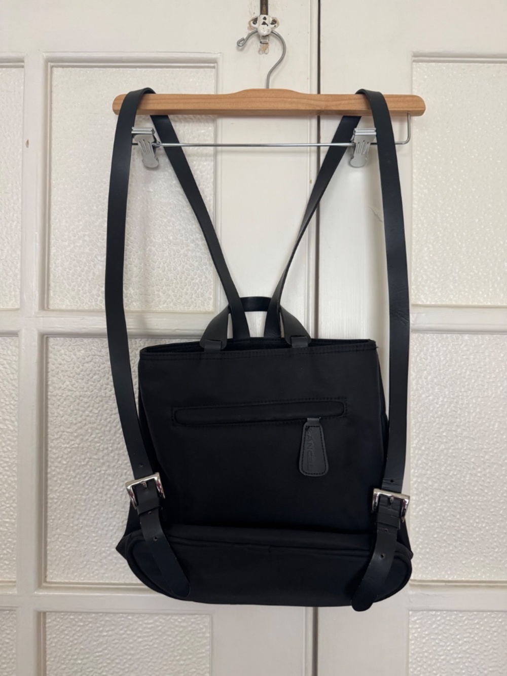 100% LANCEL Explorer backpack black nylon with leather straps.